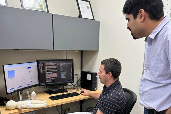 Abinav Jha and Alex Messina share a desire to reach students early to foster curiosity about science.