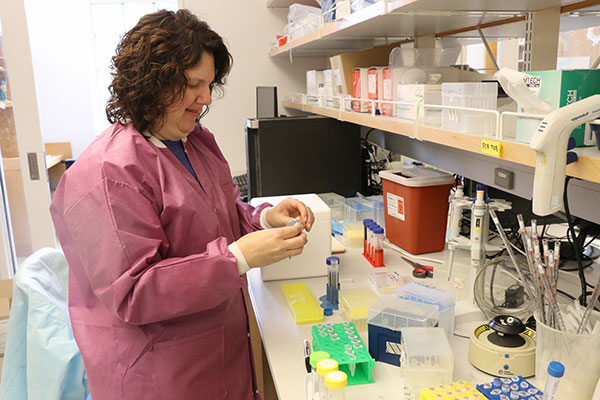 Kirstin Blase, a chemistry teacher at Villa Duchesne, spent six weeks in the lab of Michael Vahey, associate professor of biomedical engineering, developing lessons plans she can implement in her high school classroom. 